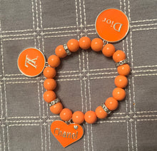 Load image into Gallery viewer, Orange designer inspired beaded bracelet (set of 2)
